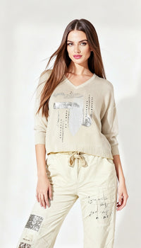 Lightening soft yellow sweater