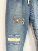 Italian jogger pants - Distressed denim with sequin patch